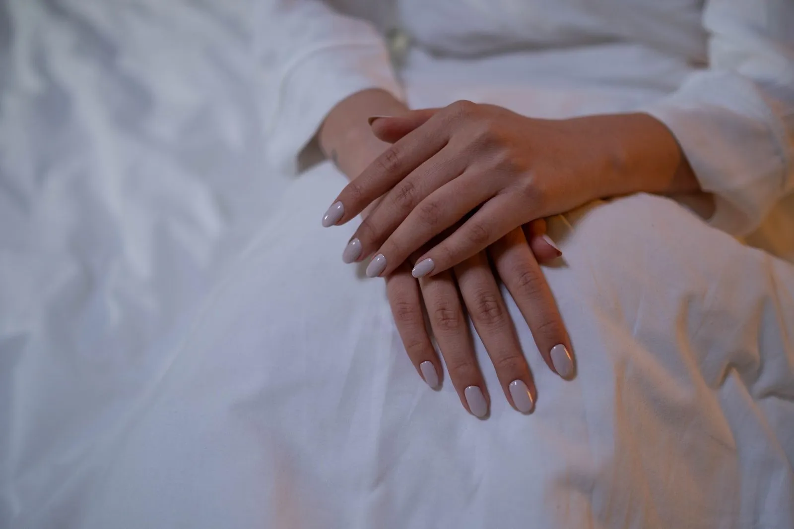 Close-up of hands resting