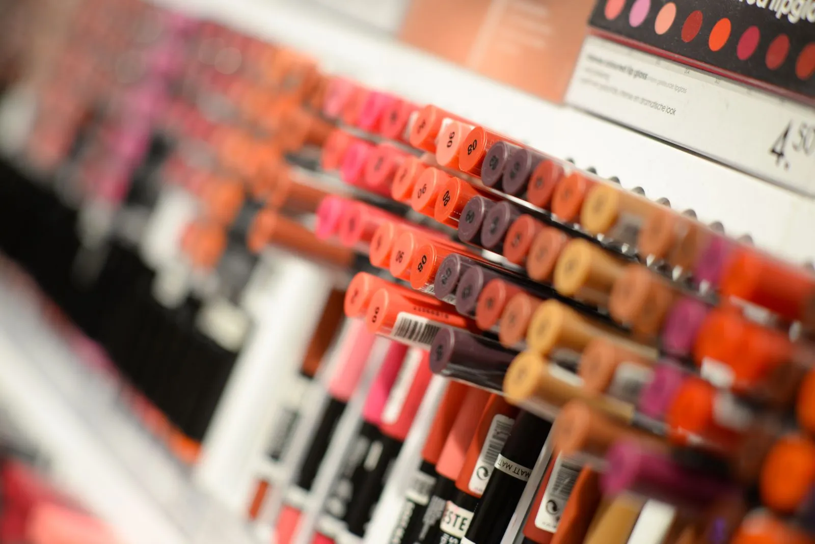 Close-up of diverse lipsticks in a store