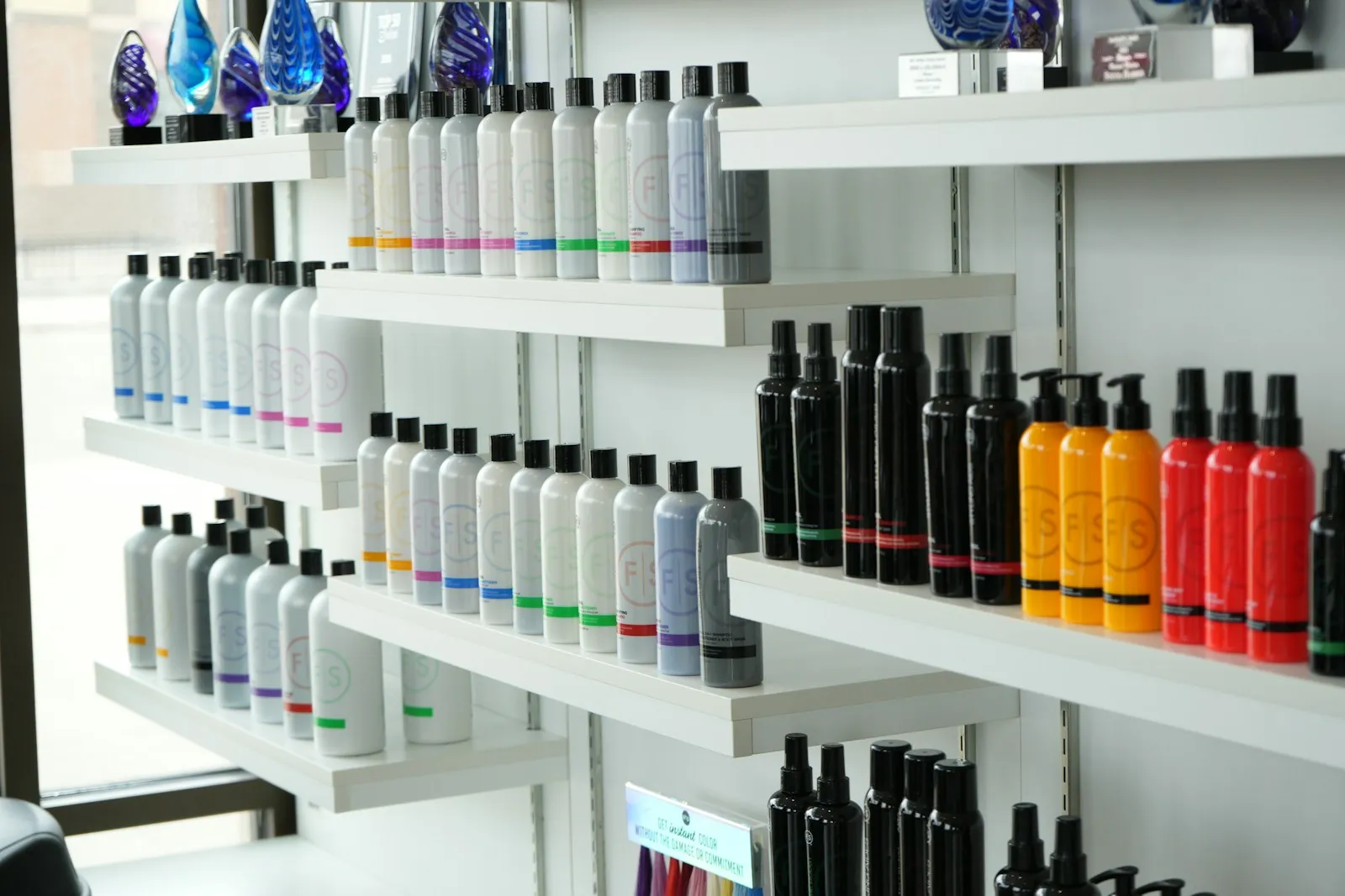 Shelves stocked with rows of hair care products